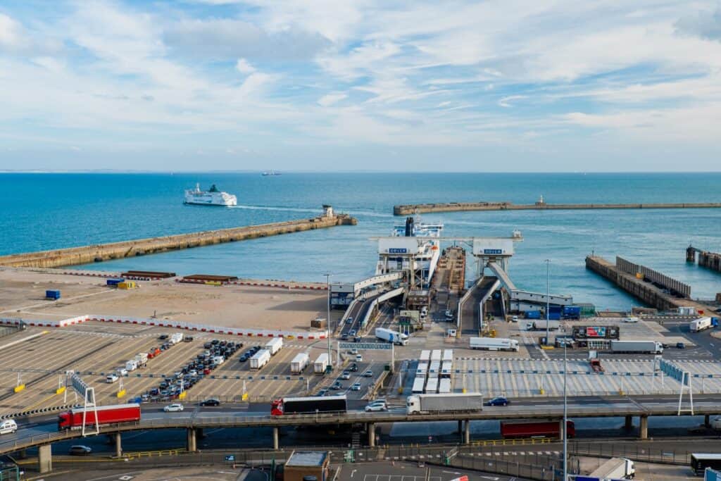 Overlooking the port of Dover with the pier and a ferry leaving.