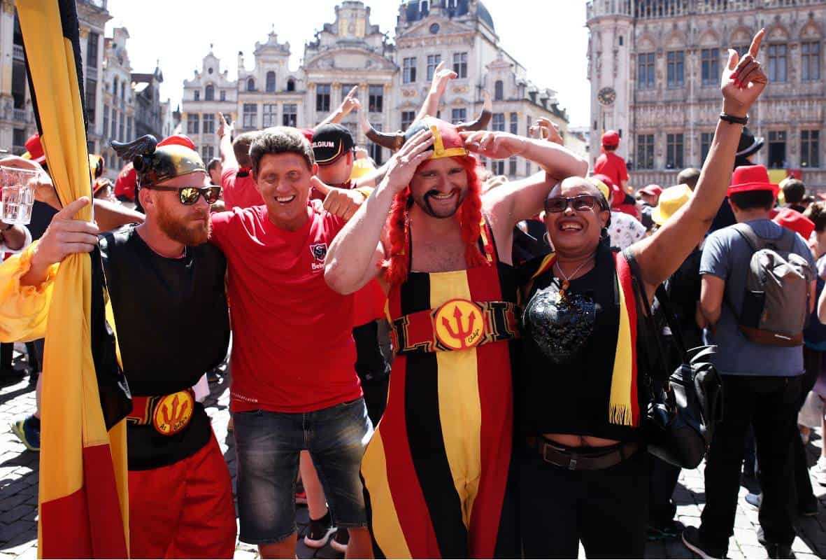 Stock Photo Four People Holding Belgian Flag 