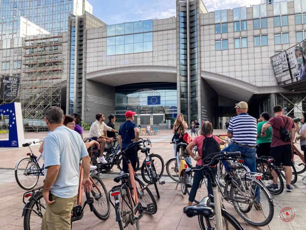 A group of cyclists gathered in front of the European Parliament building in Brussels.