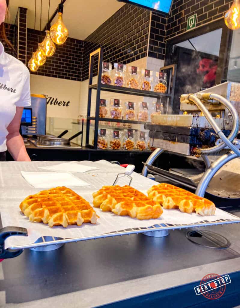 Delicious warm waffles being displayed in a waffle store in Bruges.