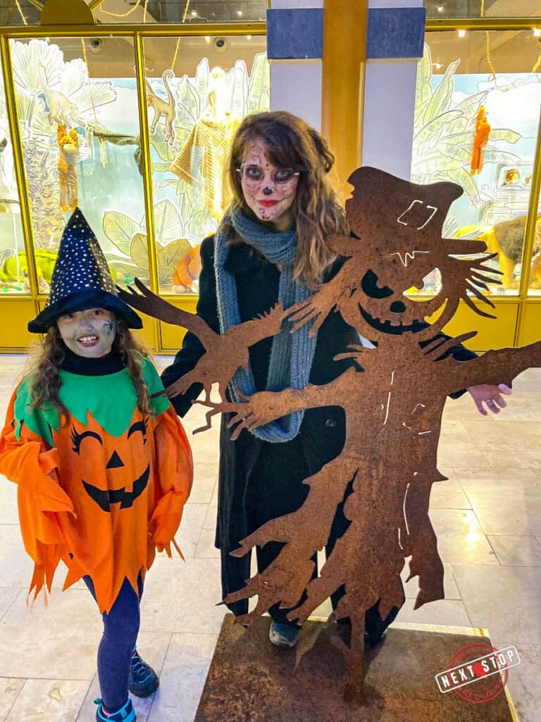 Mom and kid dressed up with halloween costumes