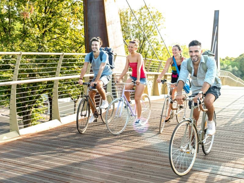 A group of friends riding a bike