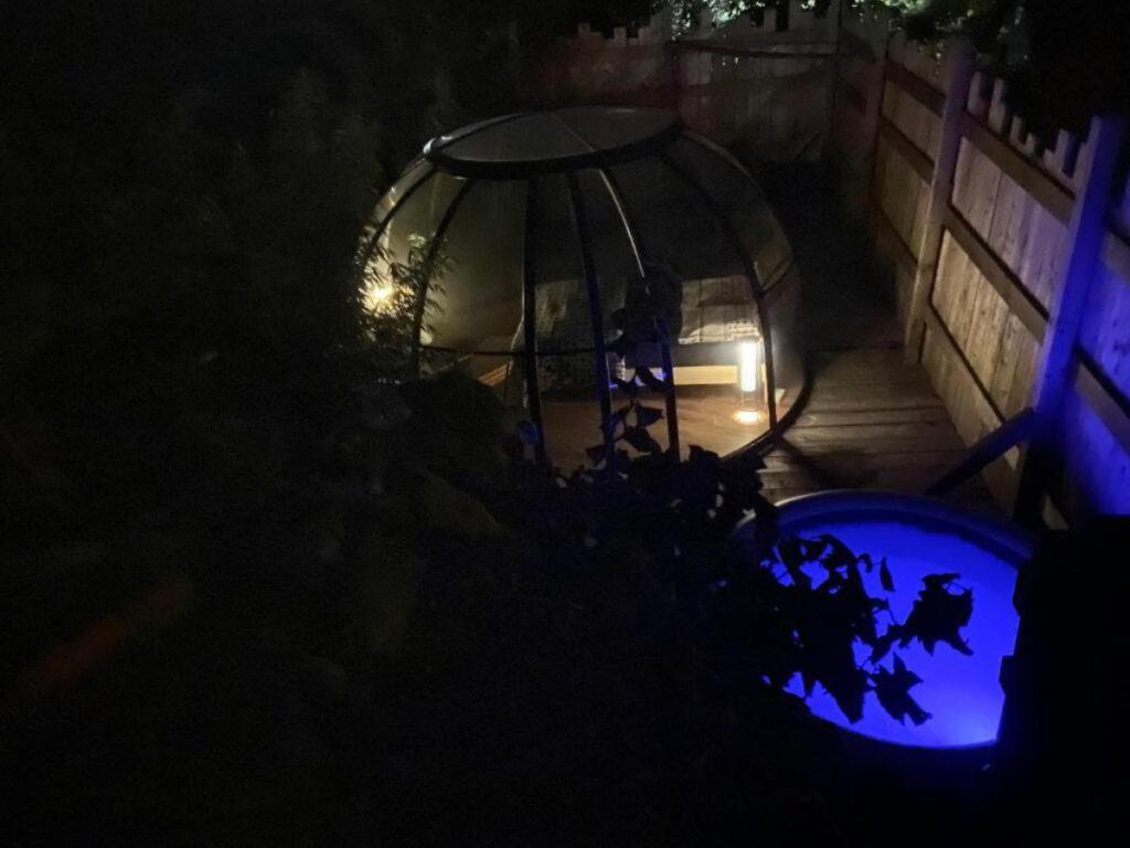 An outdoor view of the pool at 'Home Sweet Dome' in Bouillon, featuring a sparkling, inviting swimming pool set.