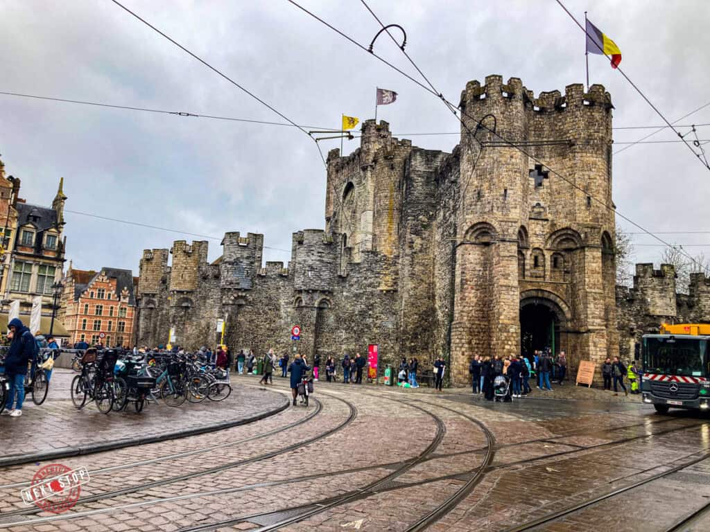 Gravensteen Castle seen from the street with the tram tracks in front.