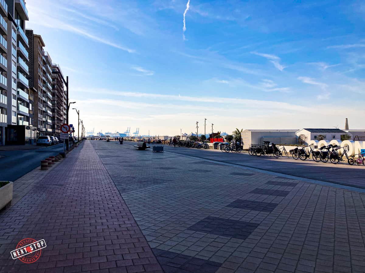 The boulevard with apartments on the left and the beach on the right.