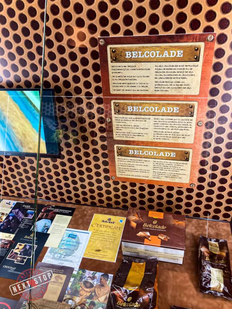 Chocolate displays in a glass cabinet.