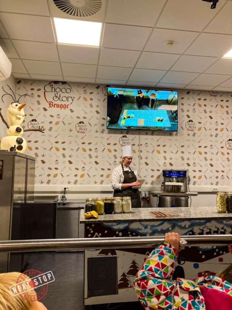 A chef giving a demo on how to create these delicious chocolates.