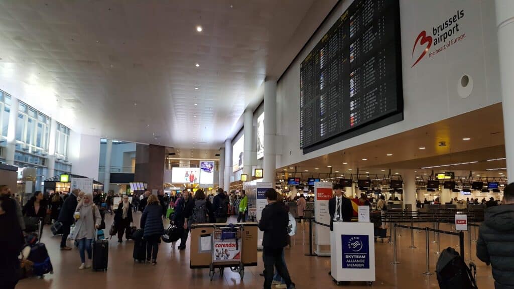 Brussels Airport Departure Hall full of people.