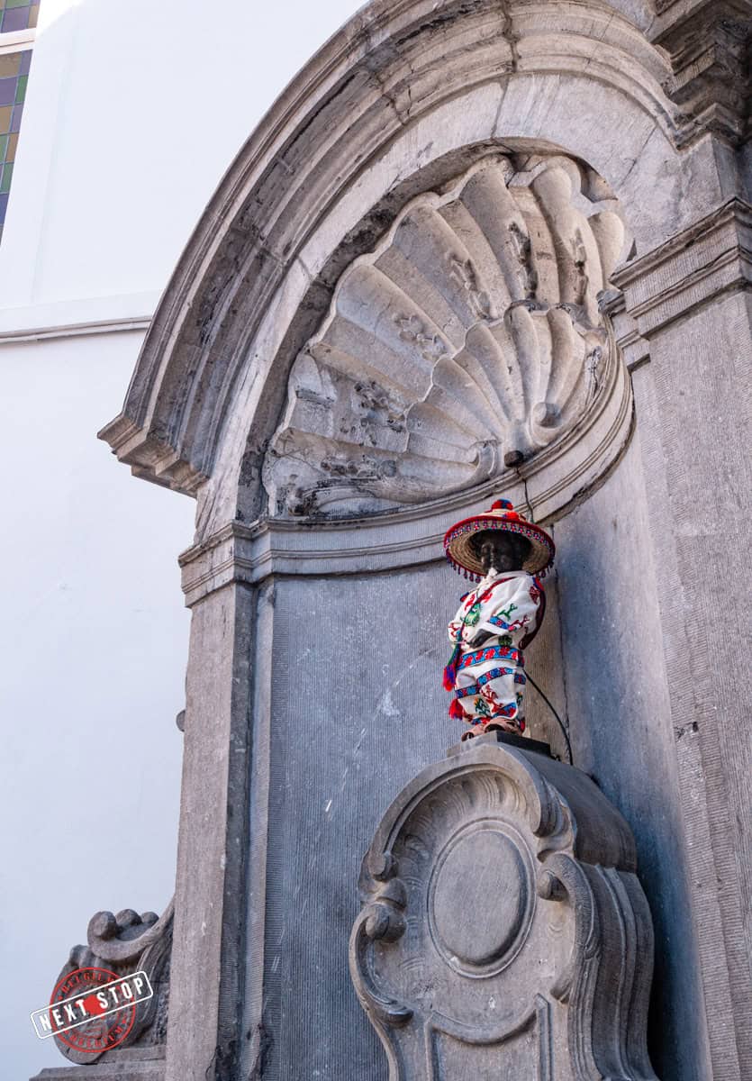 Close up of Manneken Pis wearing a Mexican outfit.