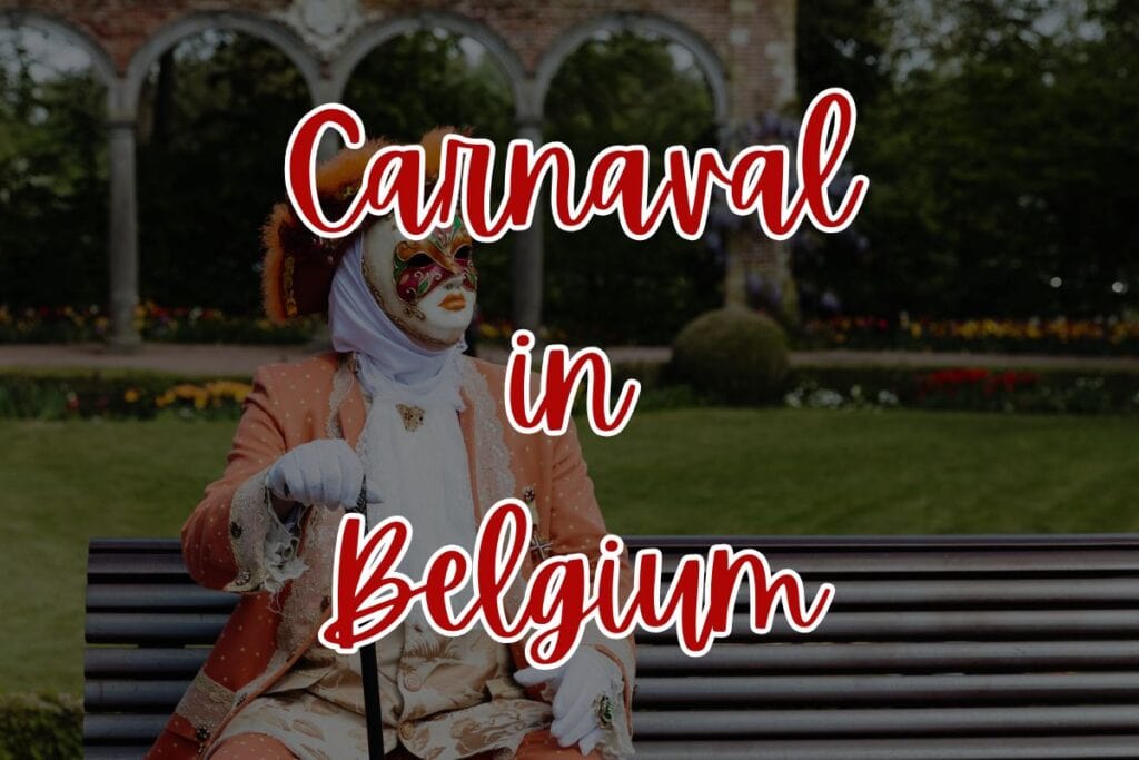 A person in an elaborate Venetian-style carnival costume sits on a park bench, wearing a decorated mask, ruffled white shirt, and peach-colored jacket with lace trim. Bold red and white script across the image reads, “Carnaval in Belgium,” suggesting a festive European carnival setting.