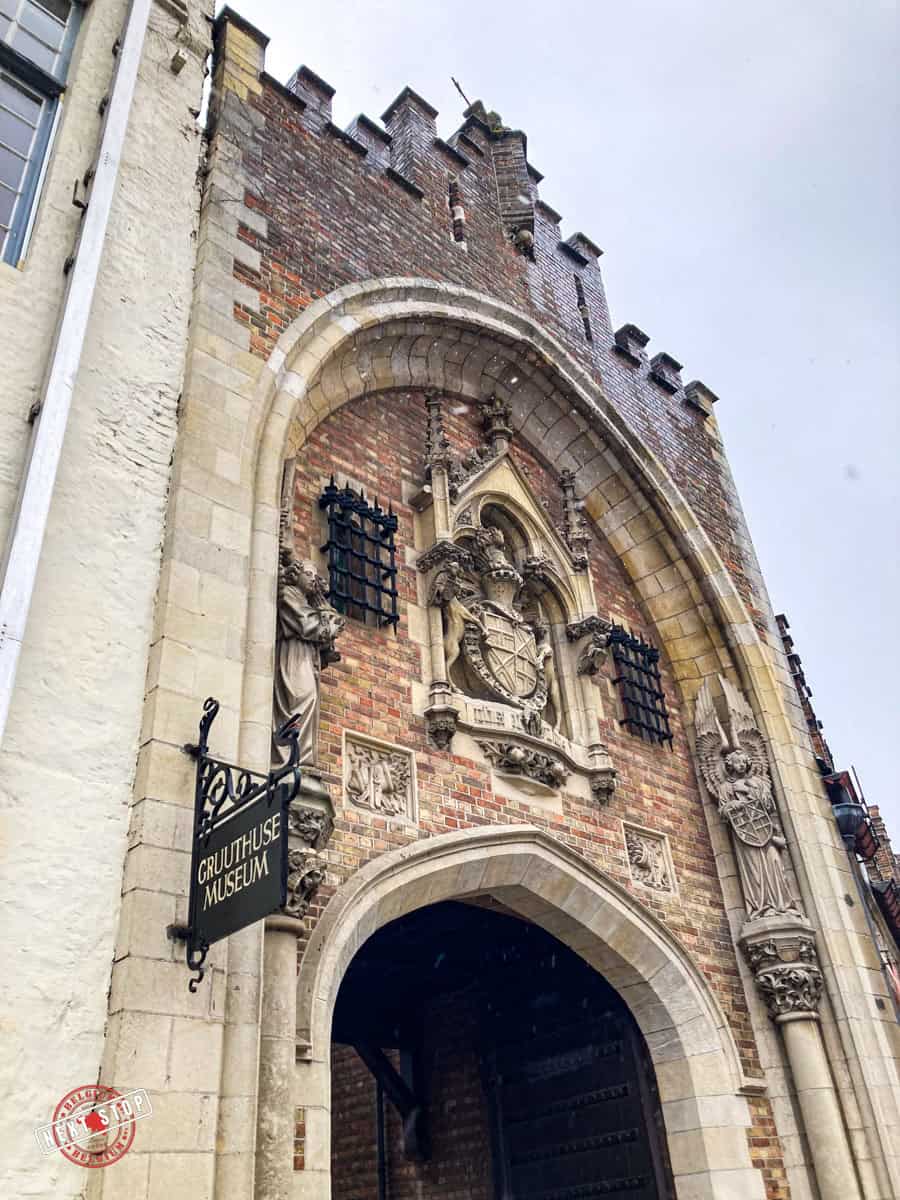 Exterior close-up of the Gruuthuse Museum archway.