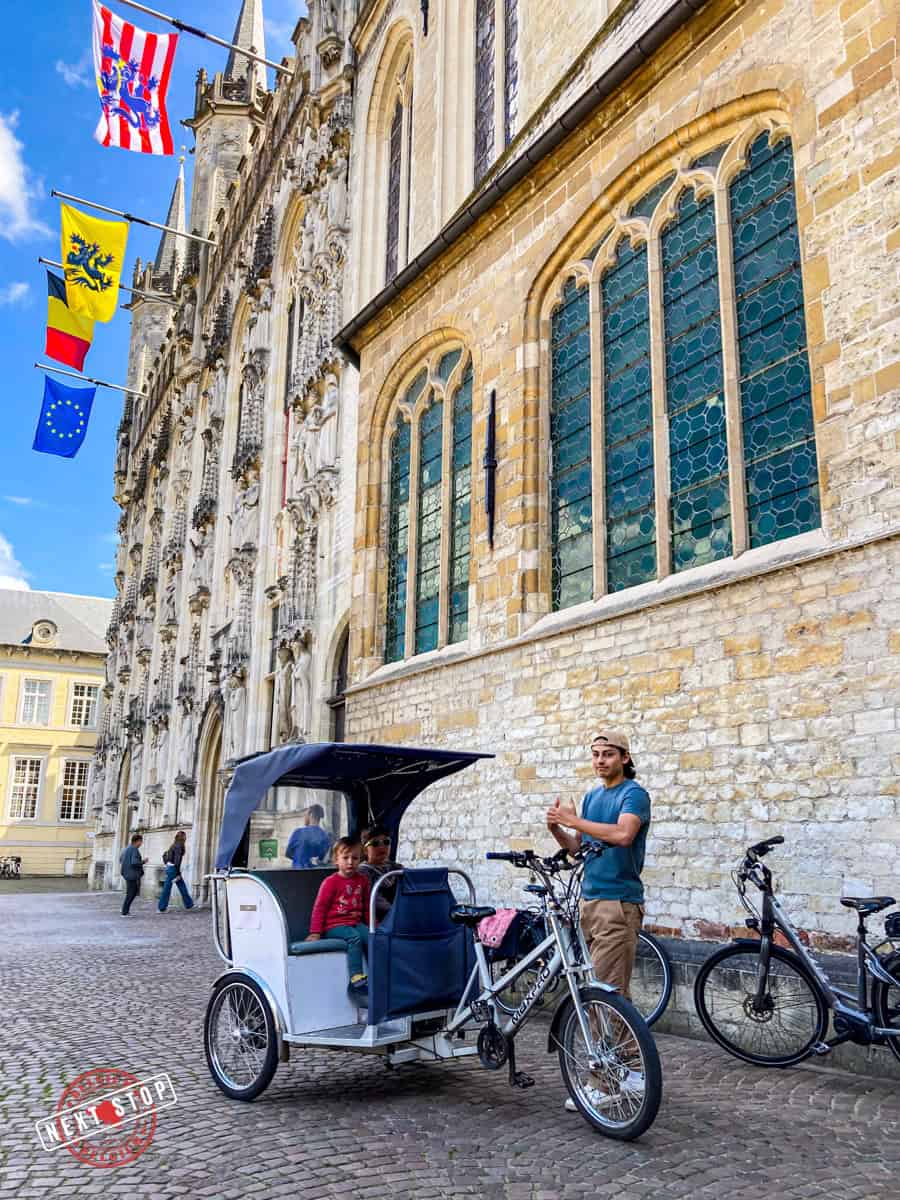 Bruges Rickshaw Square with a tour guide.